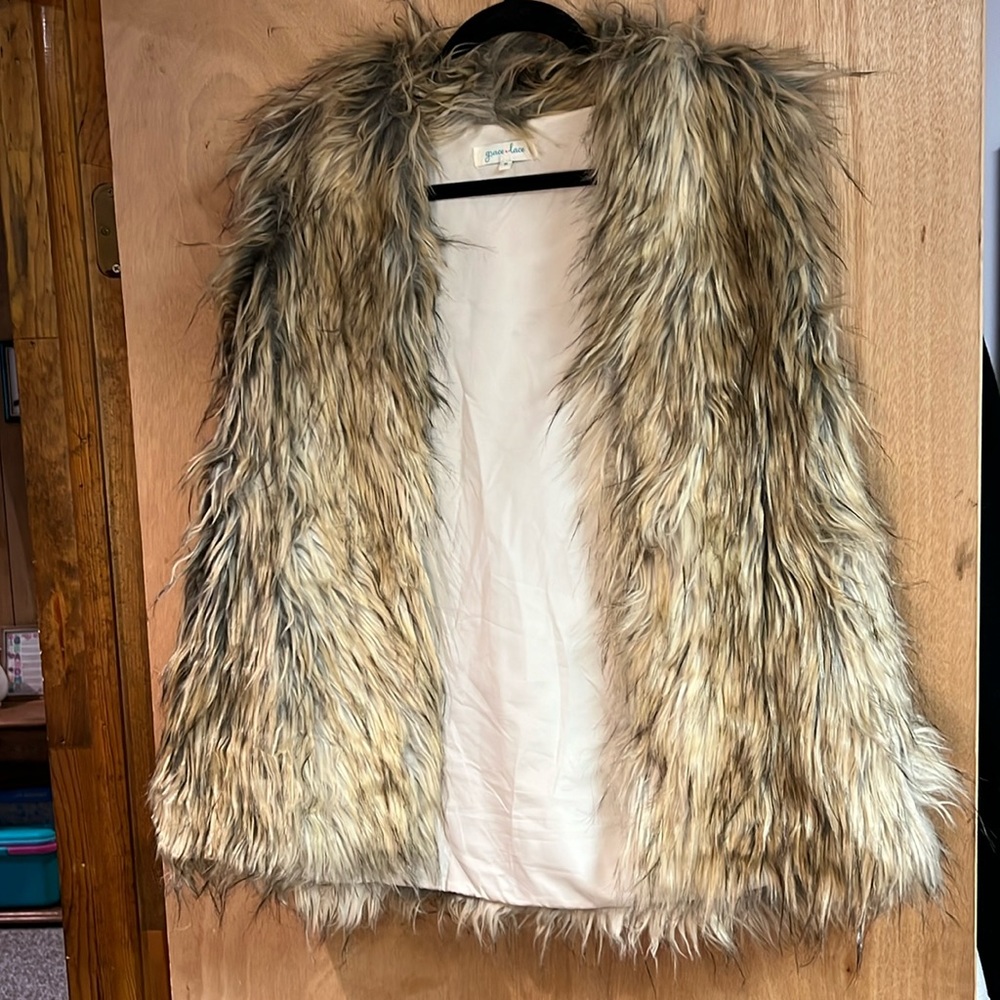 Grace and lace vest